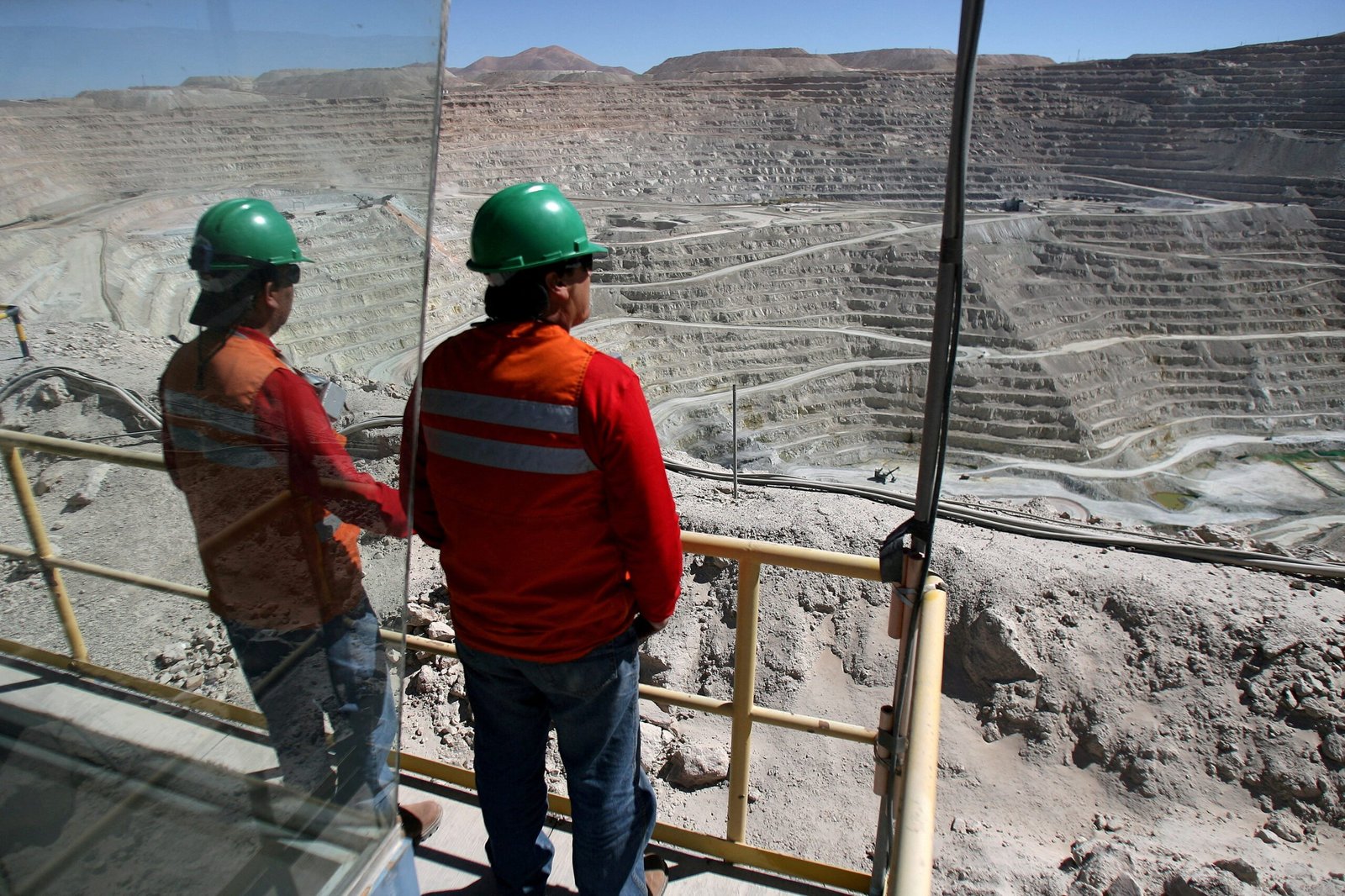 FILE PHOTO: Workers at BHP Billiton